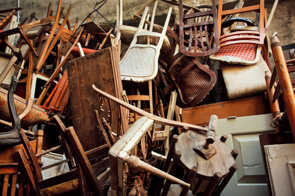 furniture storage unit cluttered furniture chairs