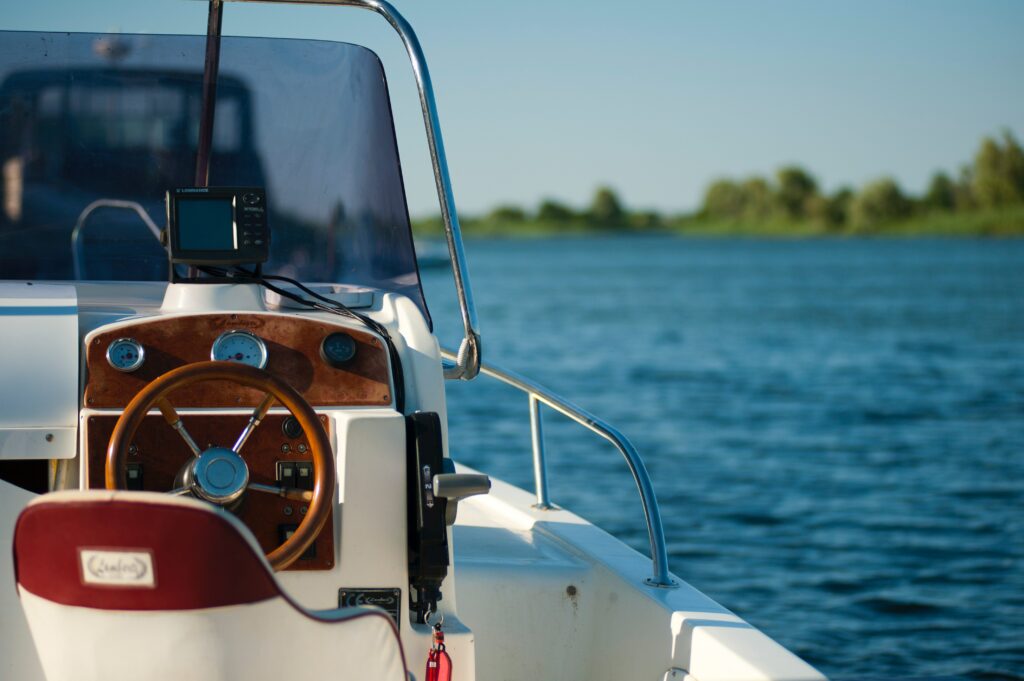 Overlooking the captains chair of a boat on the lake