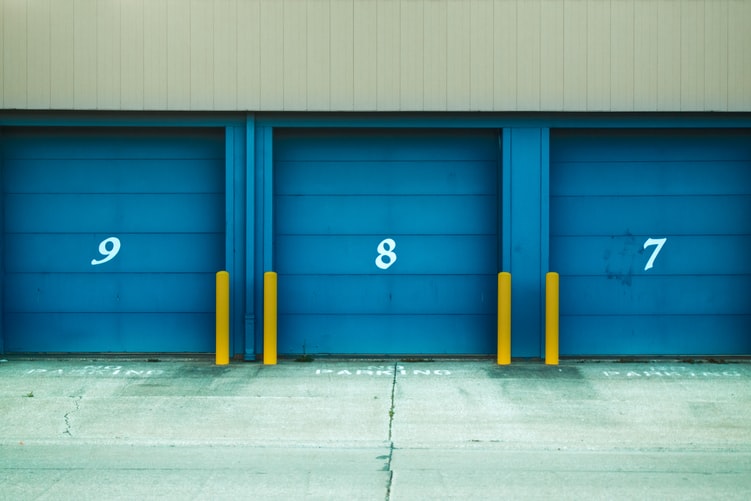 Three blue storage units